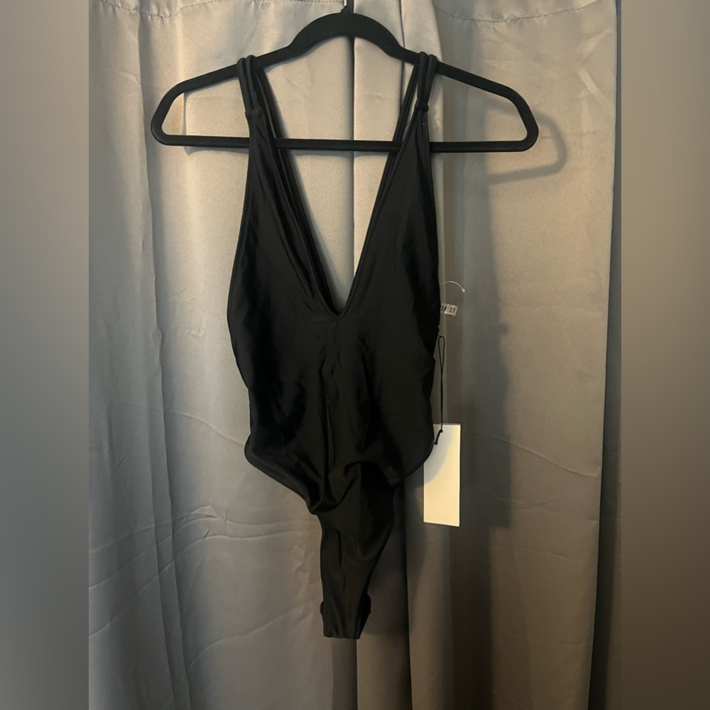 Forever 21 Black one piece bathing suit. Brand New 🖤 Size Large.